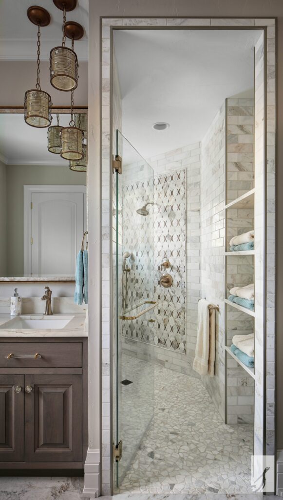 Zero entry shower with build-in shelving at Speas Interior Design near Colorado Springs, Colorado (CO)